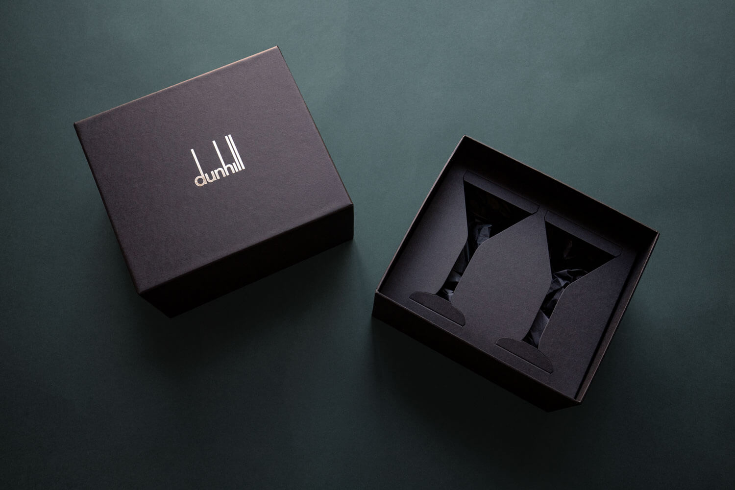 black box with silver stamped logo to hold two bespoke cocktail glasses