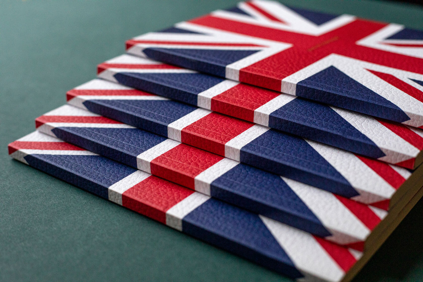 textured red white and blue union jack luxury notebooks stacked