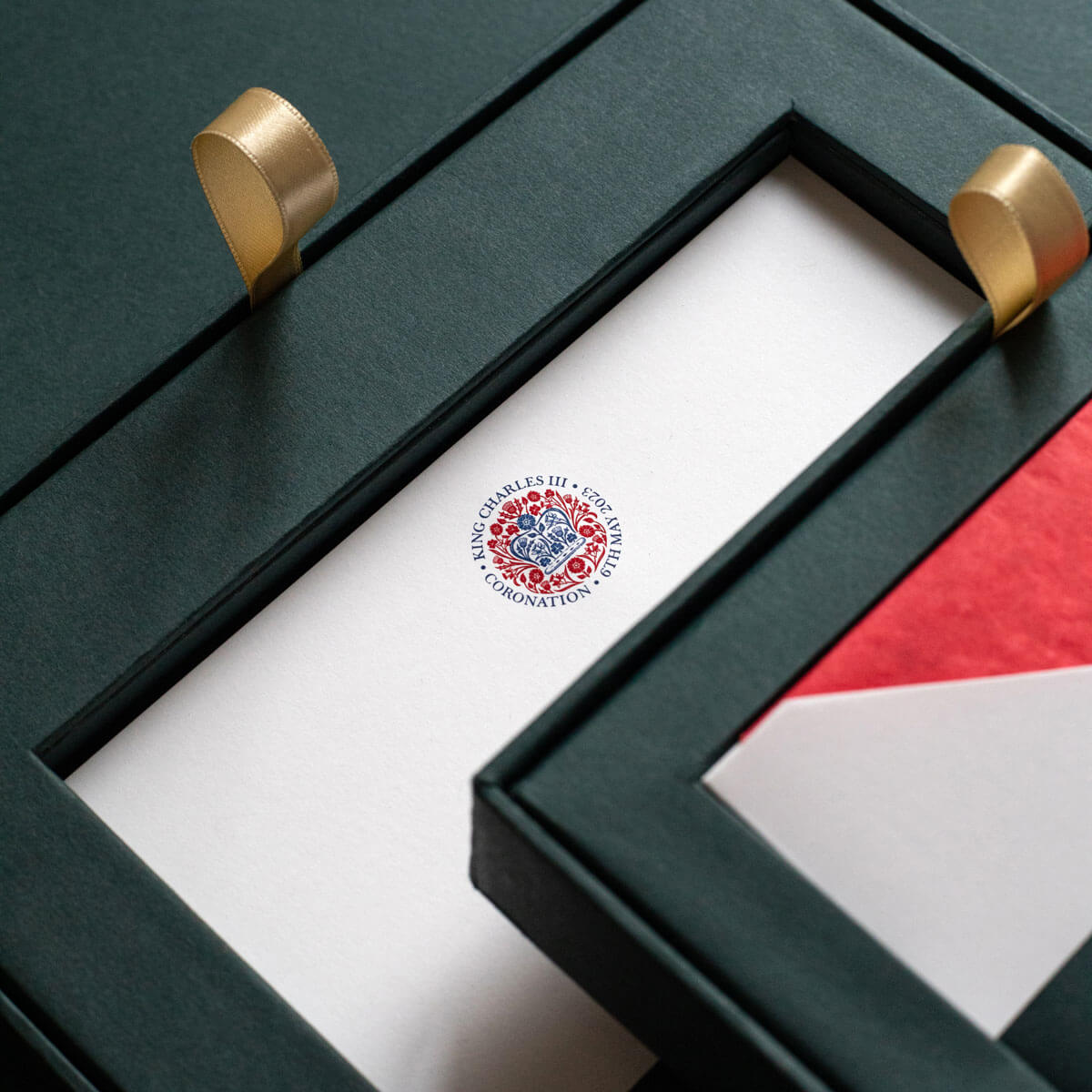 red and blue logo king charles coronation stationery in green box set