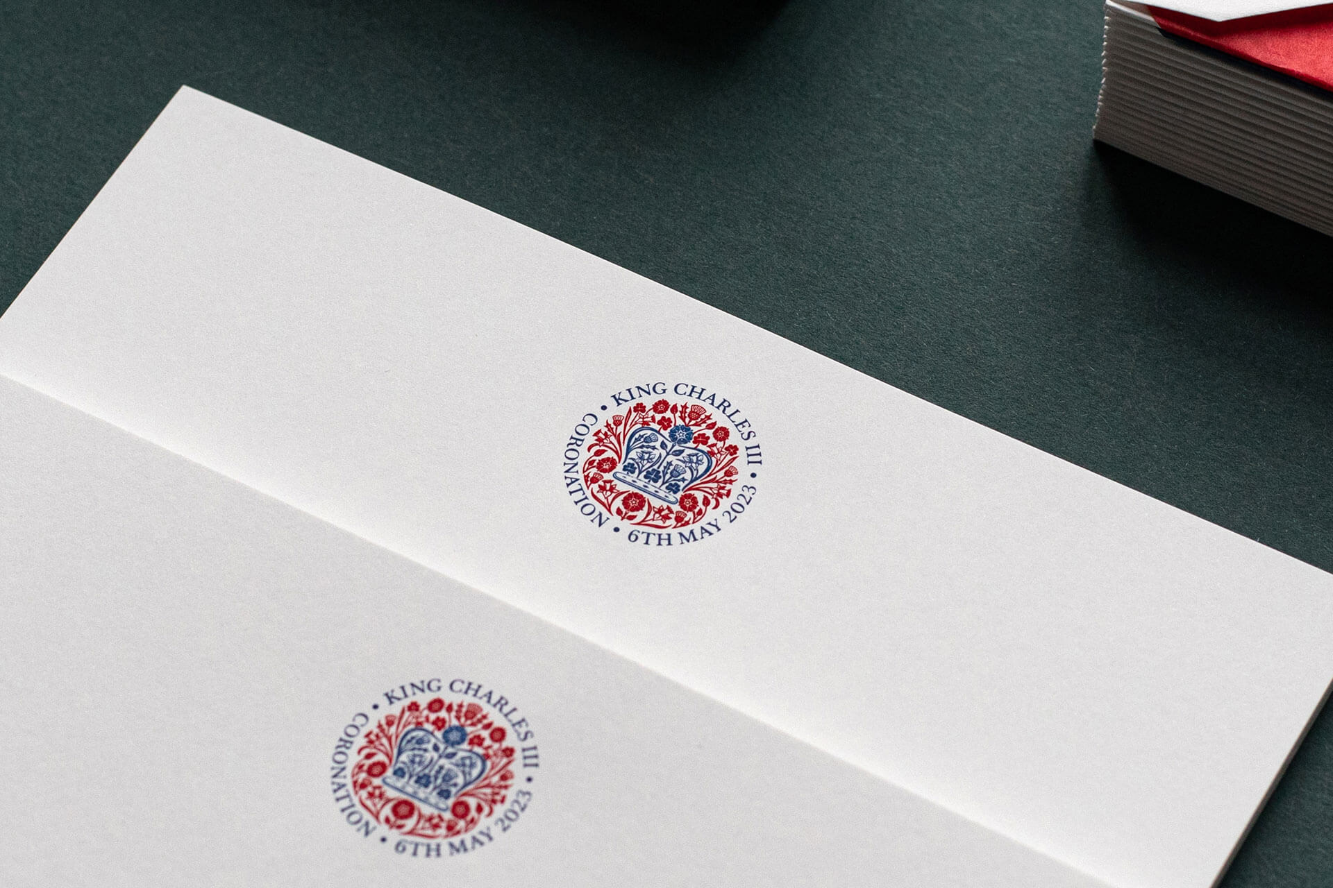 official coronation logo writing paper red and blue engraved